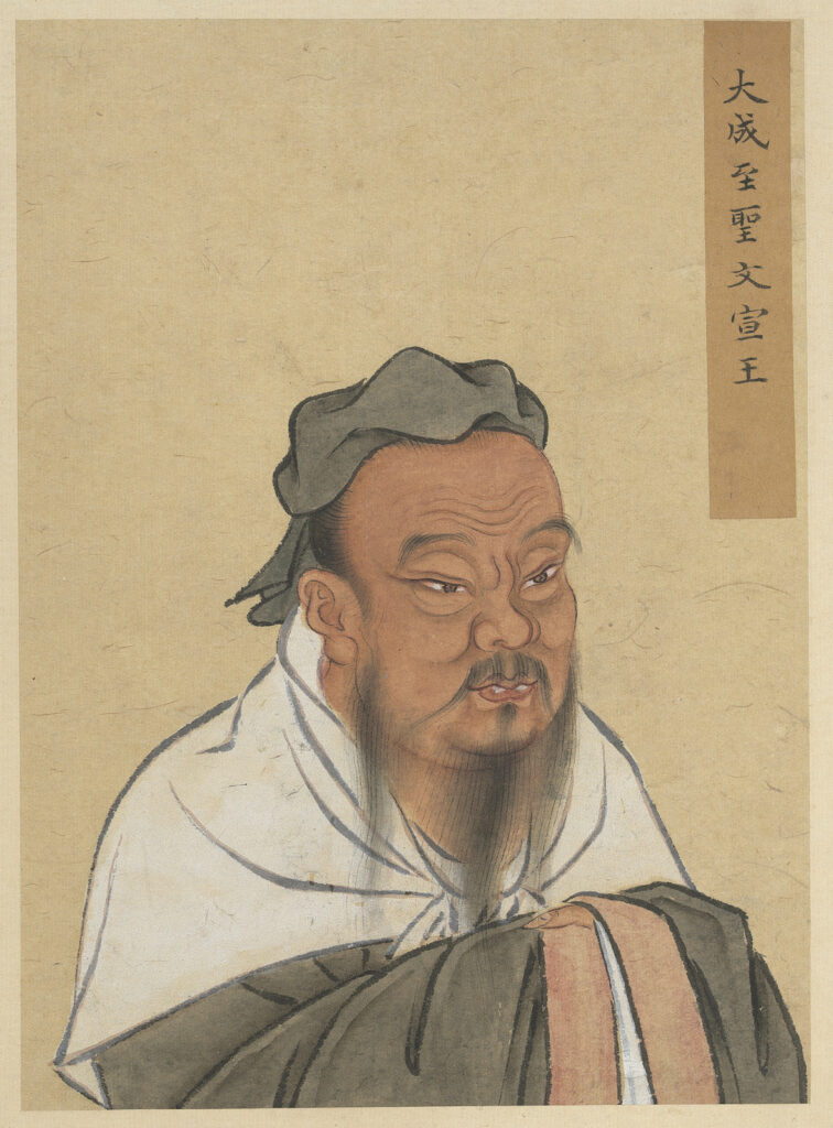 Ink and colour half-length portrait of Confucius in dark robes, hands folded, from a Qing dynasty album of portraits of ancient sages held at the National Palace Museum in Taipei.