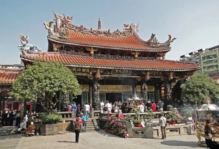 Front hall of Longshan Temple, Taipei: the three doors of the three-river hall, with the dragon door on the right when facing the temple