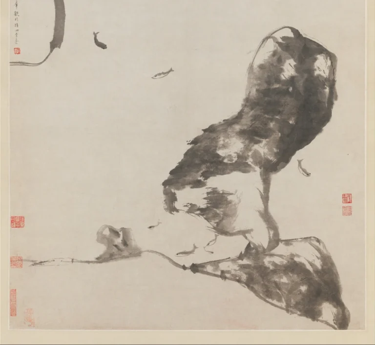 Ink painting: four small fish suspended in blank paper beside two large rocks, with no water drawn.